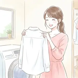 時間がたったジュースのシミをきれいに落として、笑顔で白いシャツを見つめる女性。